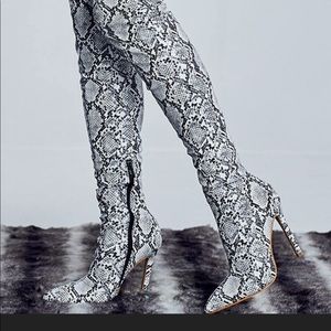 Knee high snake skin boots